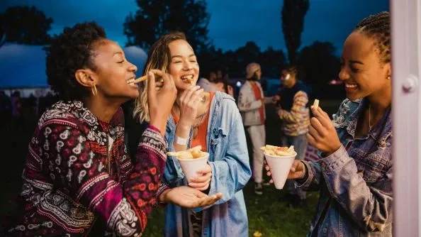 Enjoy carnival rides, live music, and good food with friends.
